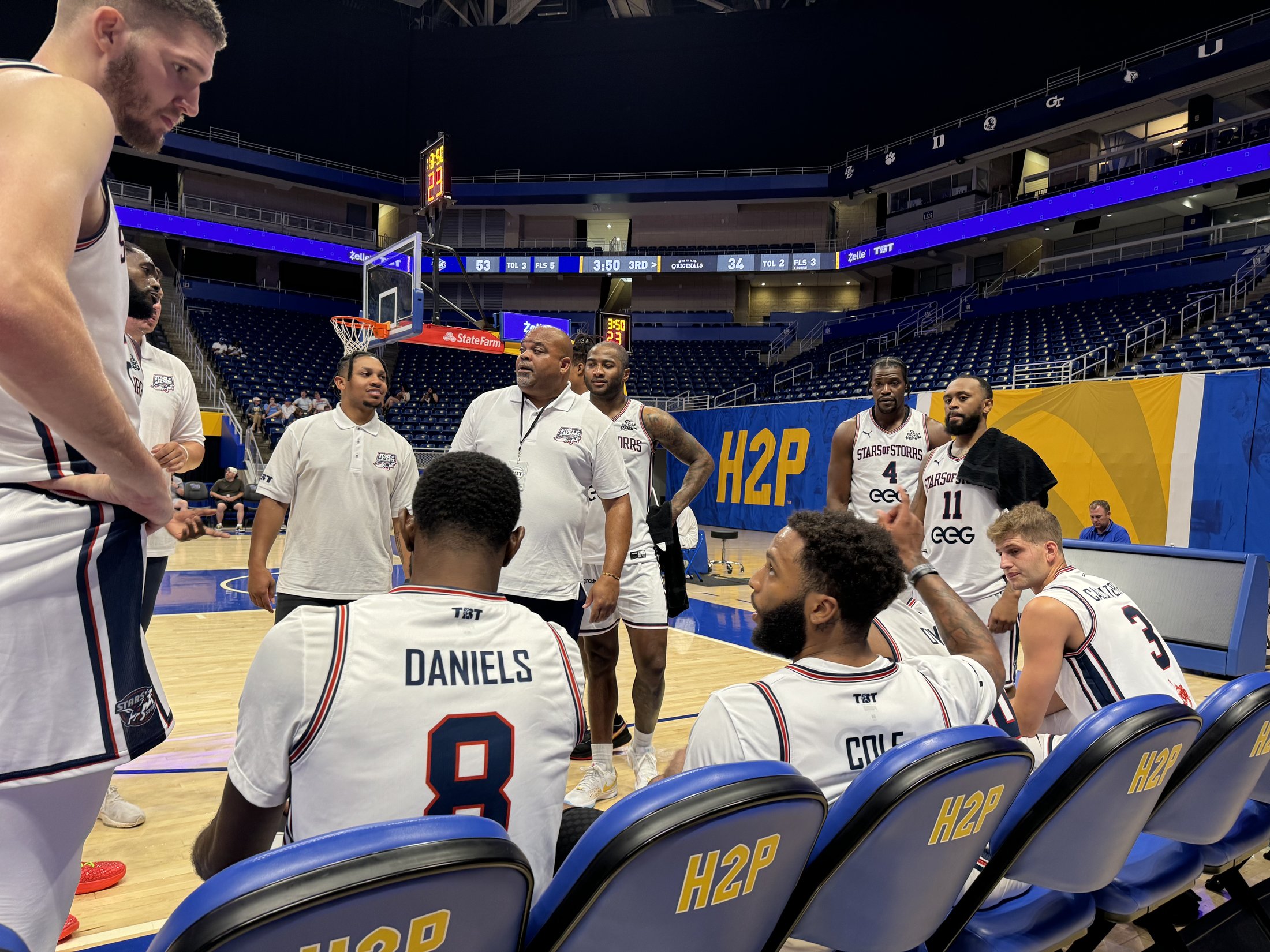 The Stars of Storrs roster huddled up in Pittsburgh, 2024, Deandre Daniels and RJ Cole's jerseys visible