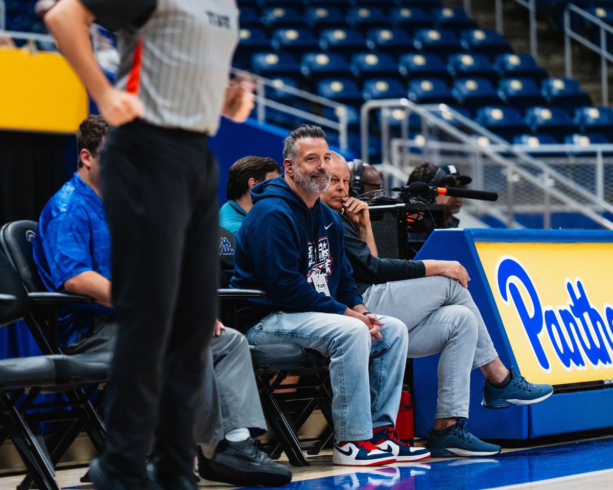 Marc D'Amelio on the bench, watching a Stars of Storrs game